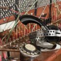 Colour photograph of a telephone switchboard with headphones