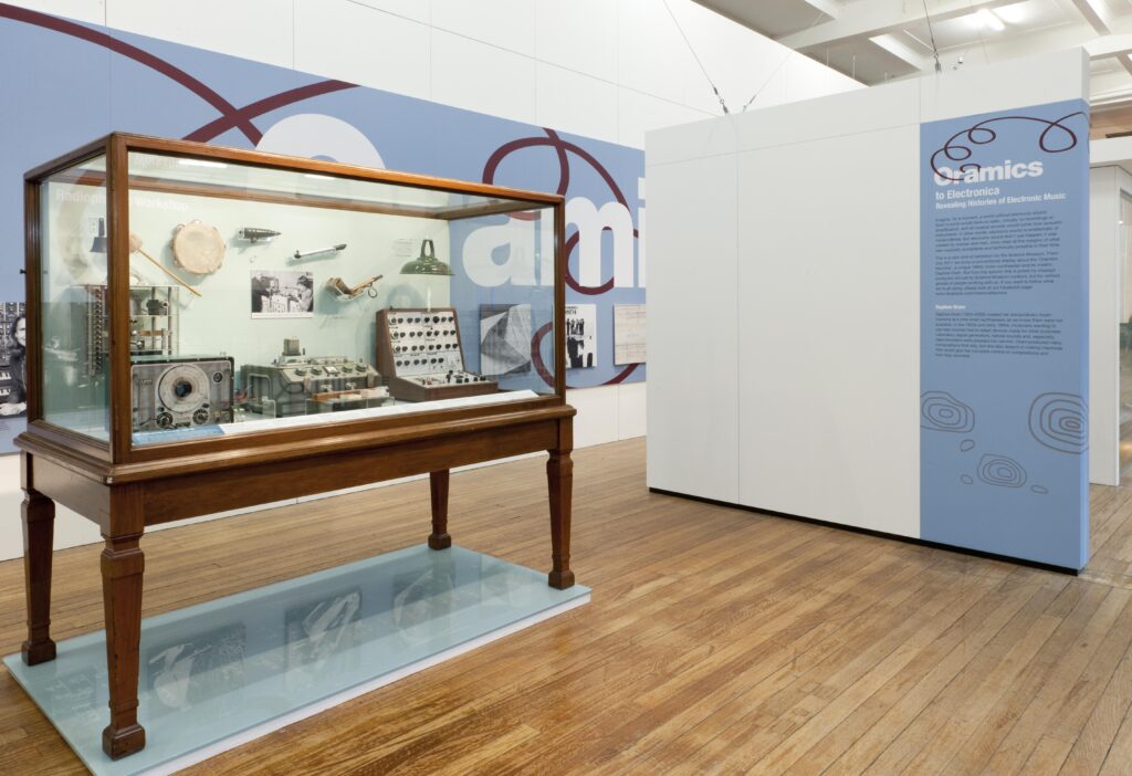 Colour photograph of a display cabinte in the From Oramics to electronica: revealing histories of electronic music exhibition at the Science Museum