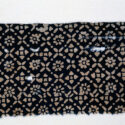 Colour photograph of a sample of Gujarati block printed cotton excavated from Egypt