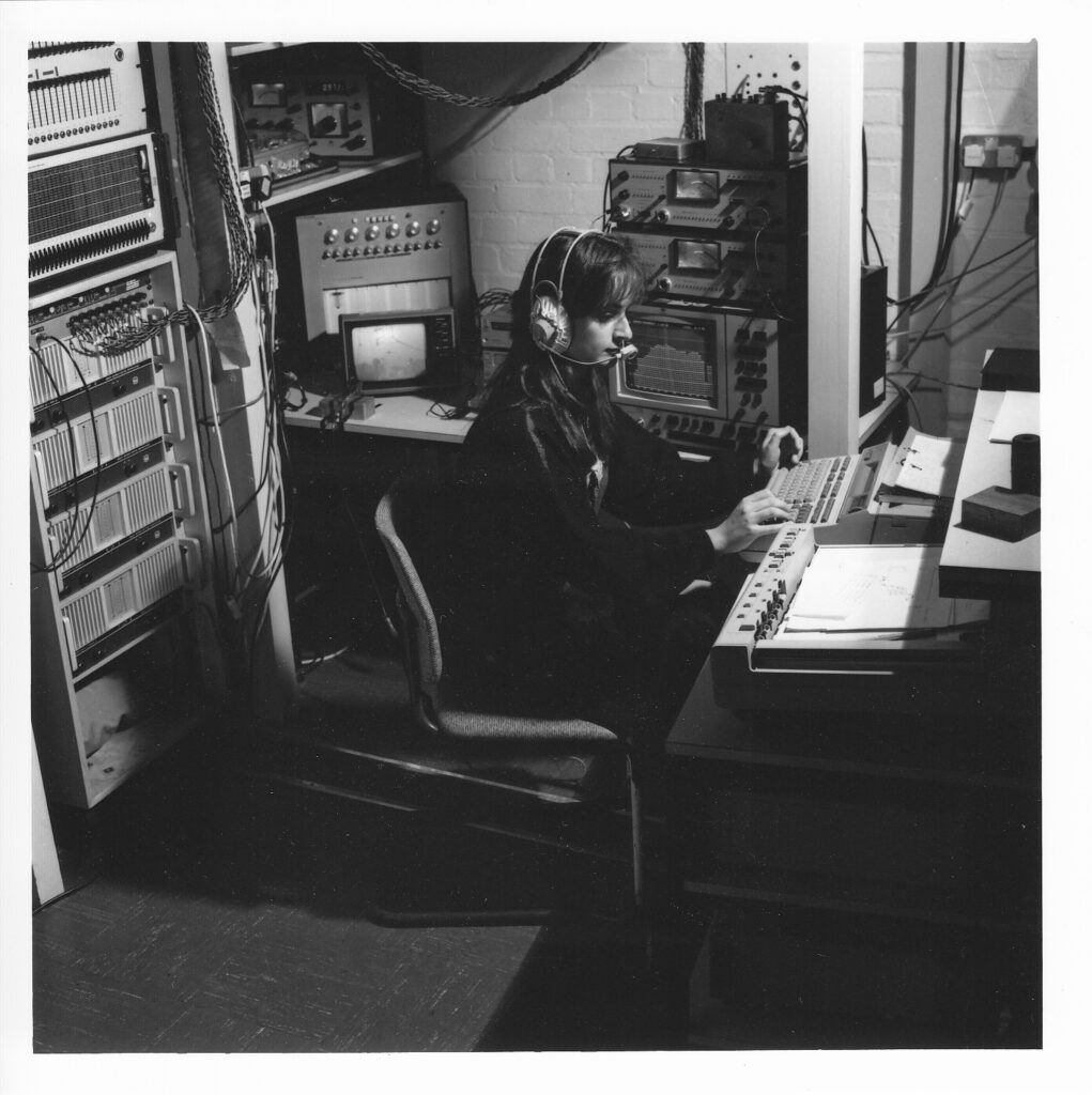 Black and white photograph of Susan James at work in the RAE acoustics laboratory circa 1980