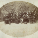 Photograph of a group of the scientists in Augusta with local authorities