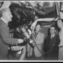 Black and white photograph of Lallemand attaching his electronic camera to the 120 inch telescope