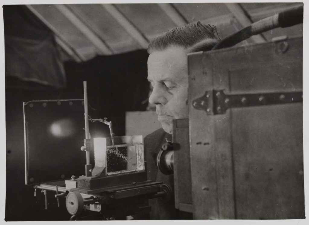 Monochrome image of Percy Smith with a Hydra Trough device
