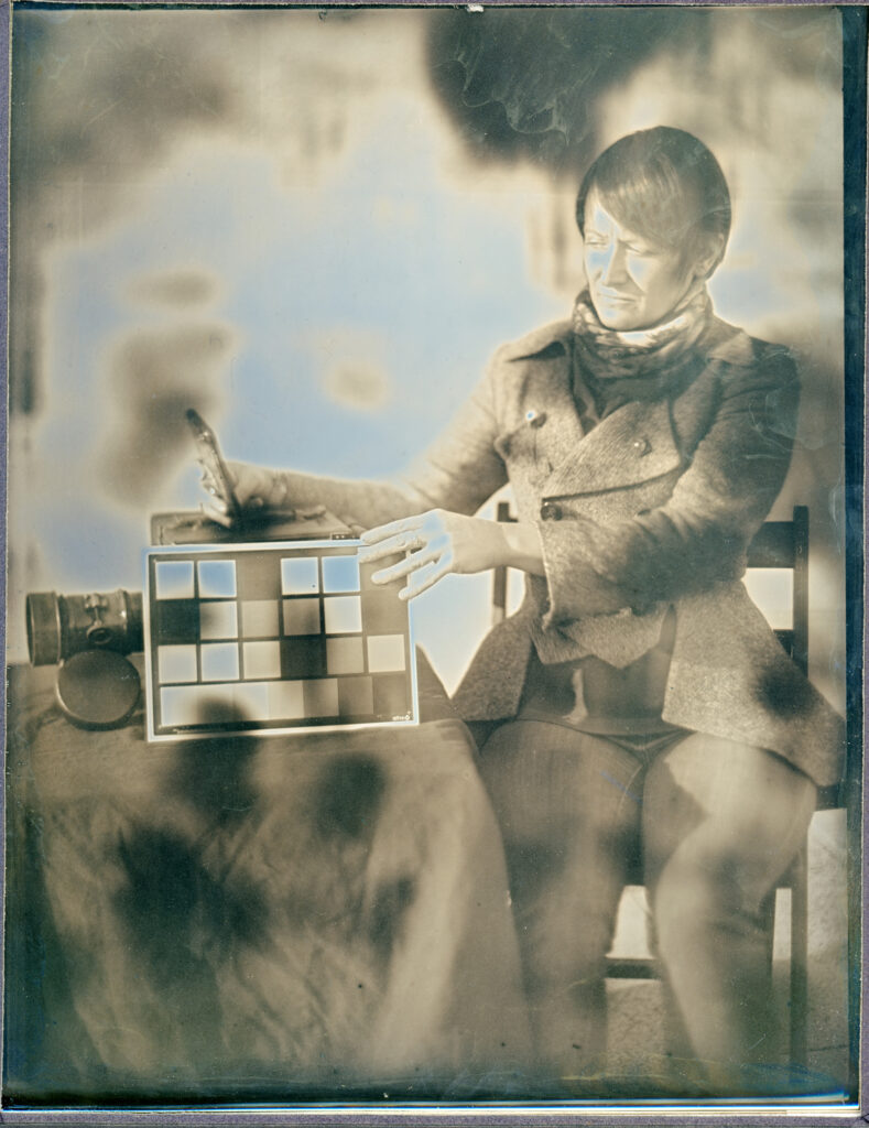 Contemporary daguerreotype image of a seated woman produced on clad silver plate