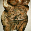 Colour photograph of an acient venus figurine made of mammoth ivory
